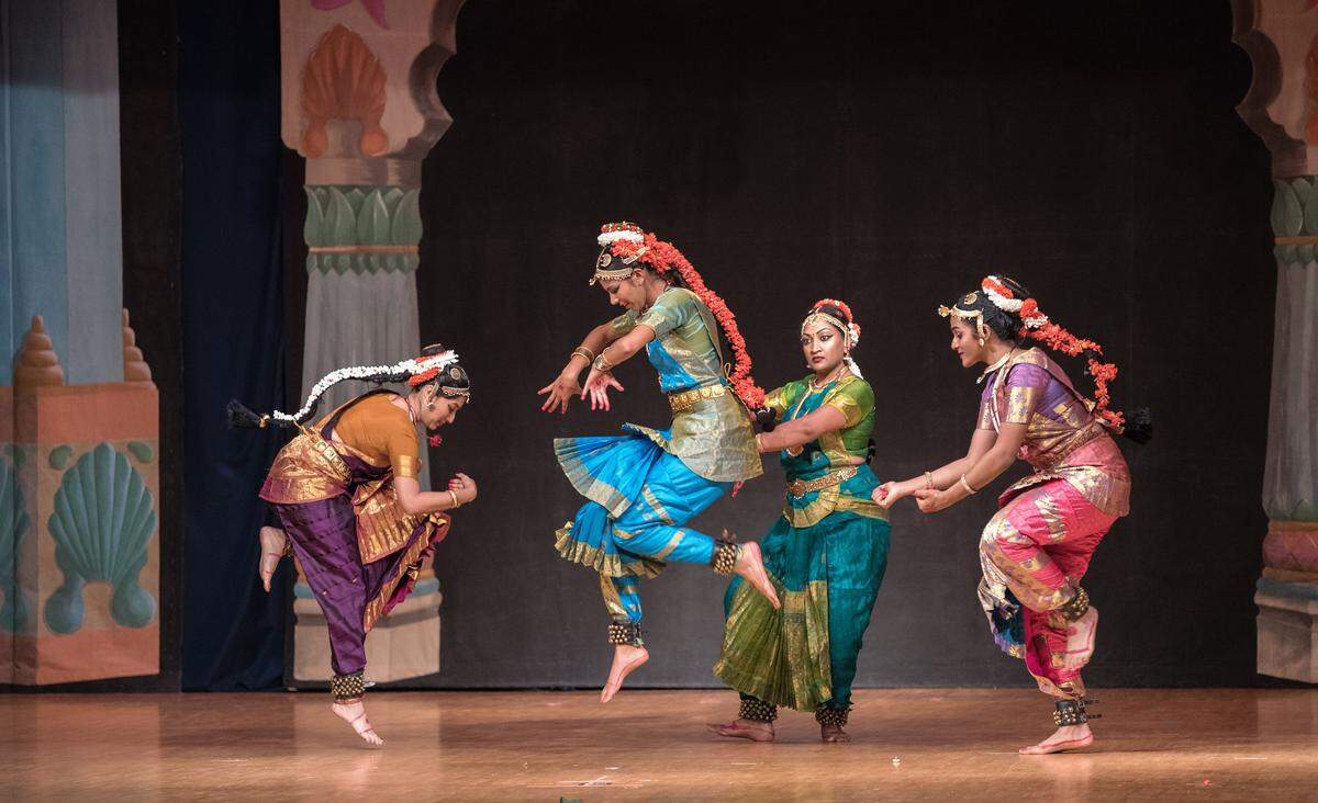 Dancers perform in the classical Indian dance style of Bharatha Natyam, in a piece that depicts the Ganges River overflowing at an annual Dances of India production. This year’s show takes place at Matthews Community Center on May 31.