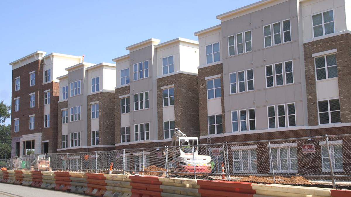 Construction workers were working on the new Haven49 apartment building on University Boulevard on Wednesday, August 29, 2018. Move-in at the apartment complex has been delayed twice and students are living in hotels.