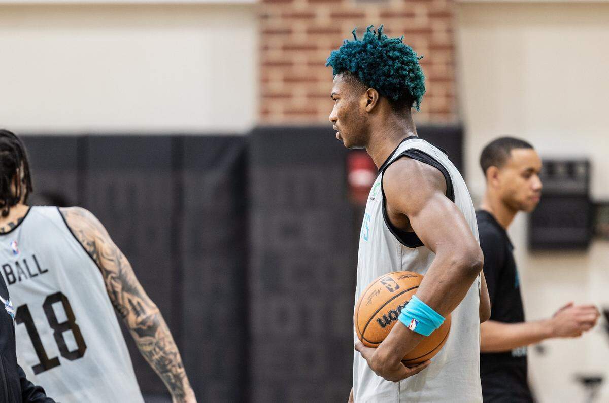 Kai Jones holds a ball during Hornets training camp at the Spectrum Center in Charlotte N.C., on Wednesday, September 28, 2022.