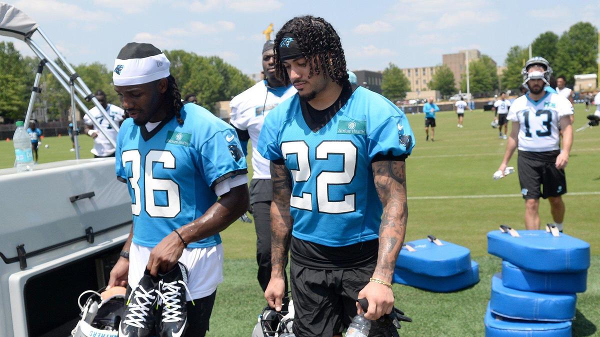 Demani Richardson, #36, and Lathan Ransom, #22, Panthers safeties, head to the locker room after practice.The Carolina Panthers, in their second week of organized team activities, ran through drills on Tuesday, June 3, 2025 at their practice facility in uptown Charlotte.