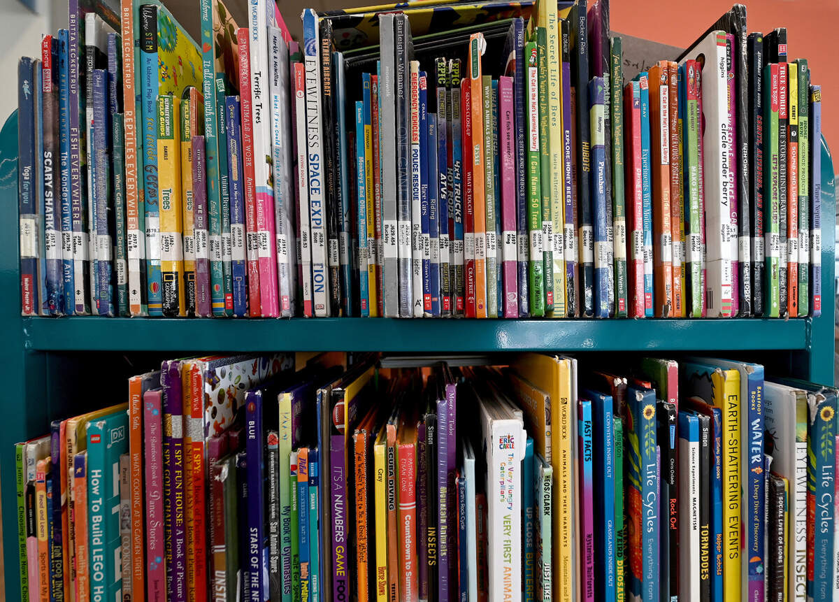 North Carolina libraries could be affected by proposed cuts in the federal budget proposed by President Donald Trump. This file photo shows books collected on a cart to be shelved at the new University City Regional Library.