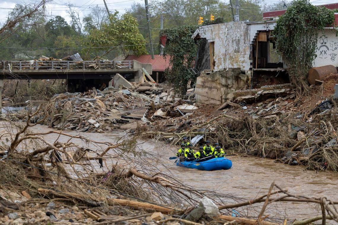 A rescue team paddles down the Swannanoa River on Sunday, Sept. 29, 2024. The remnants of Hurricane Helene caused widespread flooding, downed trees, and power outages in western North Carolina.