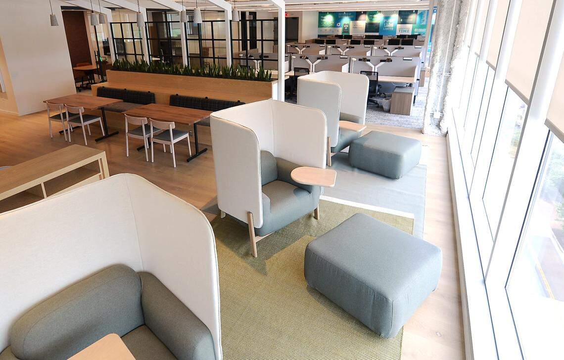 Pods with ottomans provide employees a workspace and privacy at the new LendingTree headquarters in South End.