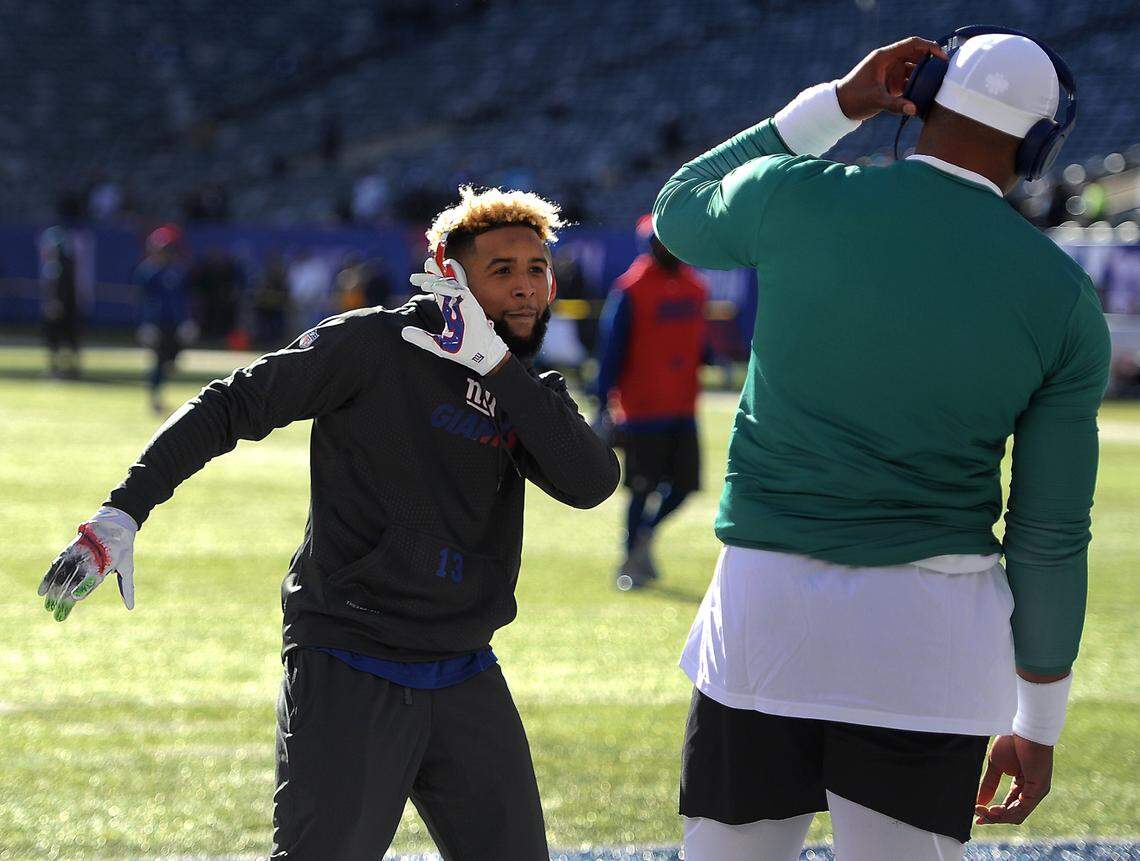 New York Giants wide receiver Odell Beckham Jr., left, dances in front of Carolina Panthers quarterback Cam Newton, right, as the team’s warmed up prior to NFL action at MetLife Stadium in East Rutherford, NJ on Sunday, December 20, 2015.