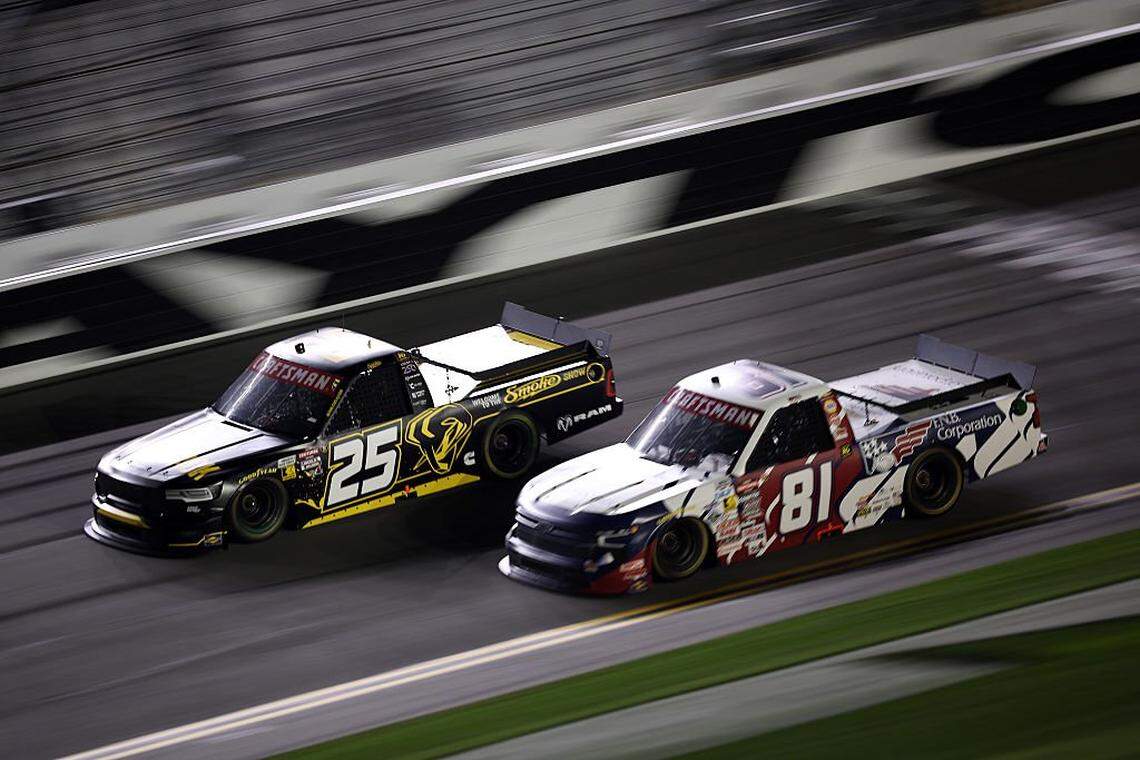DAYTONA BEACH, FLORIDA - FEBRUARY 13: Tony Stewart, driver of the #25 Ram RAM, and Kris Wright, driver of the #81 F.N.B. Corporation Chevrolet, race during the NASCAR Craftsman Truck Series Fresh from Florida 250 at Daytona International Speedway on February 13, 2026 in Daytona Beach, Florida. (Photo by James Gilbert/Getty Images)