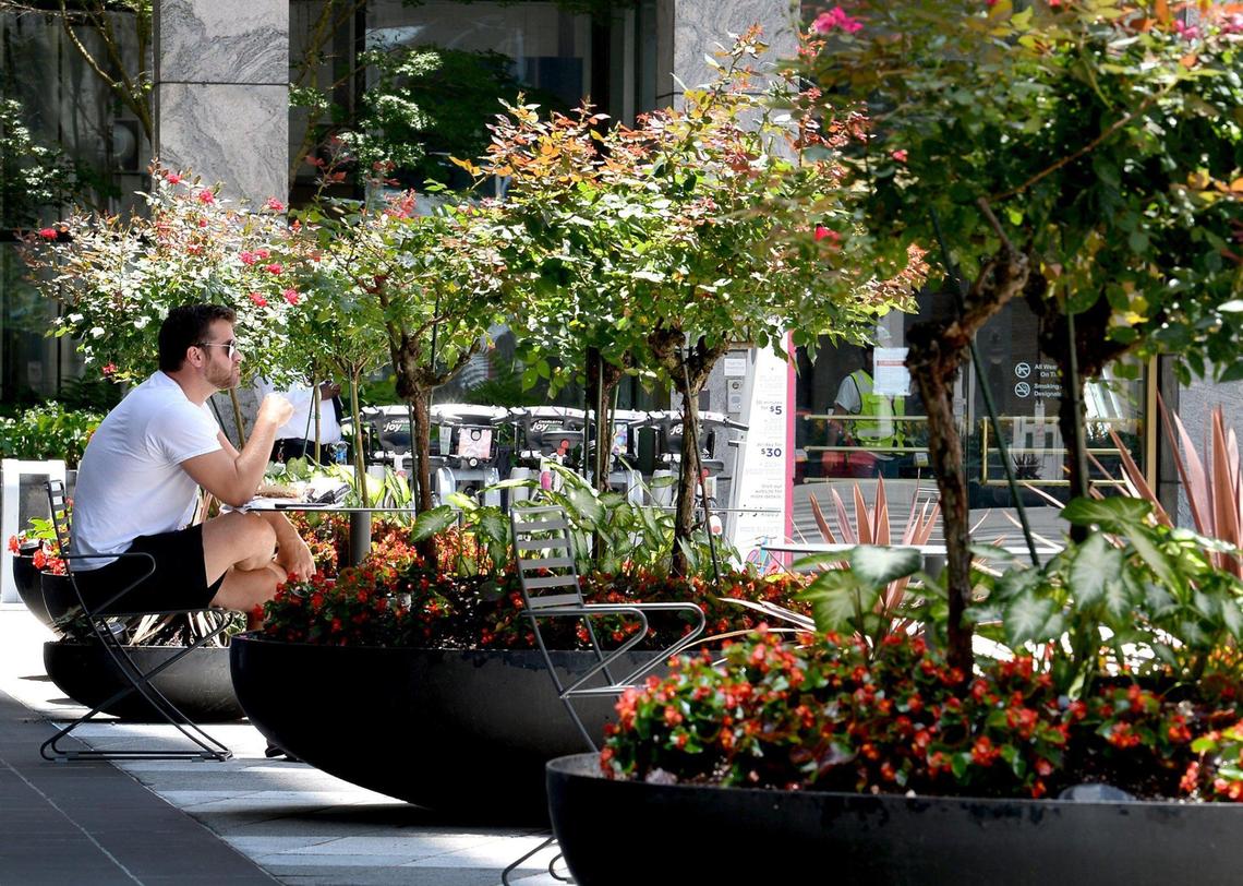 Robert Schaff enjoys a quiet lunch at The Plaza at Two Wells Fargo Center in uptown Charlotte, NC on Monday, June 28, 2021.