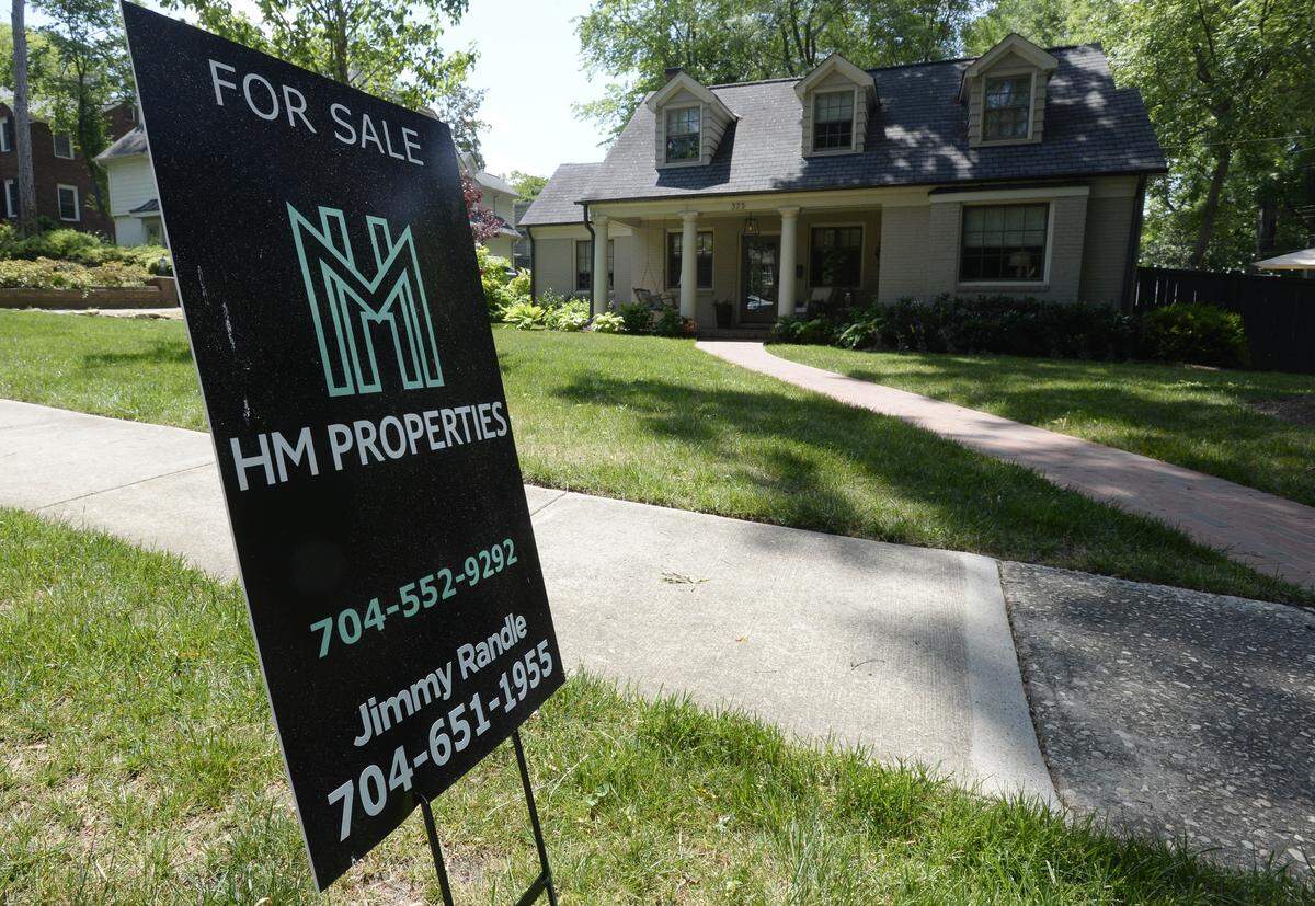 A home for sale along Hillside Avenue in Charlotte on Wednesday, May 9, 2018.