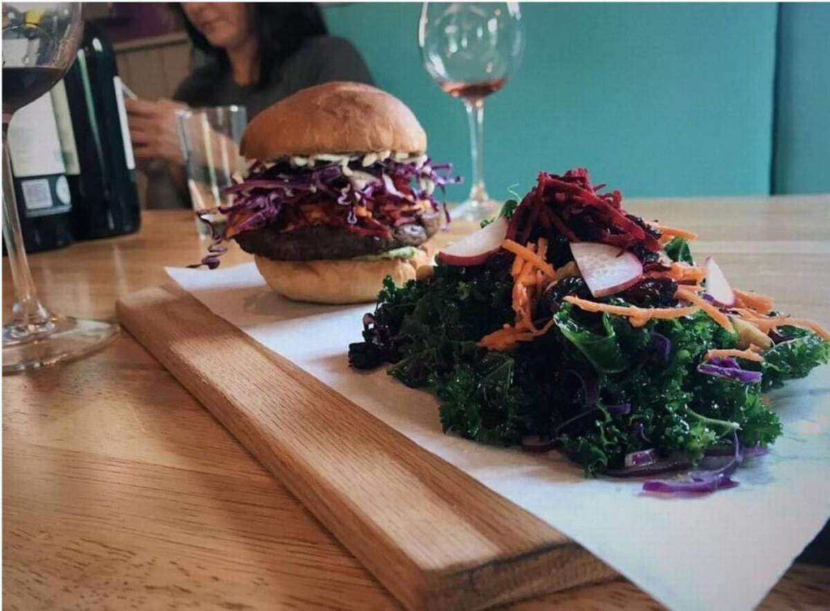The Just Beet It is an Impossible Burger with a house-made cashew basil cheese. Get it with a side kale salad.