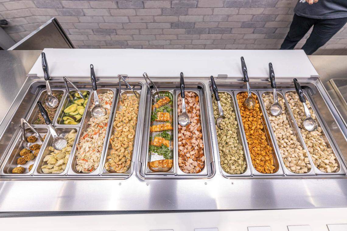 Salata has a variety of protein options including falafel, crab, shrimp, salmon and chicken.