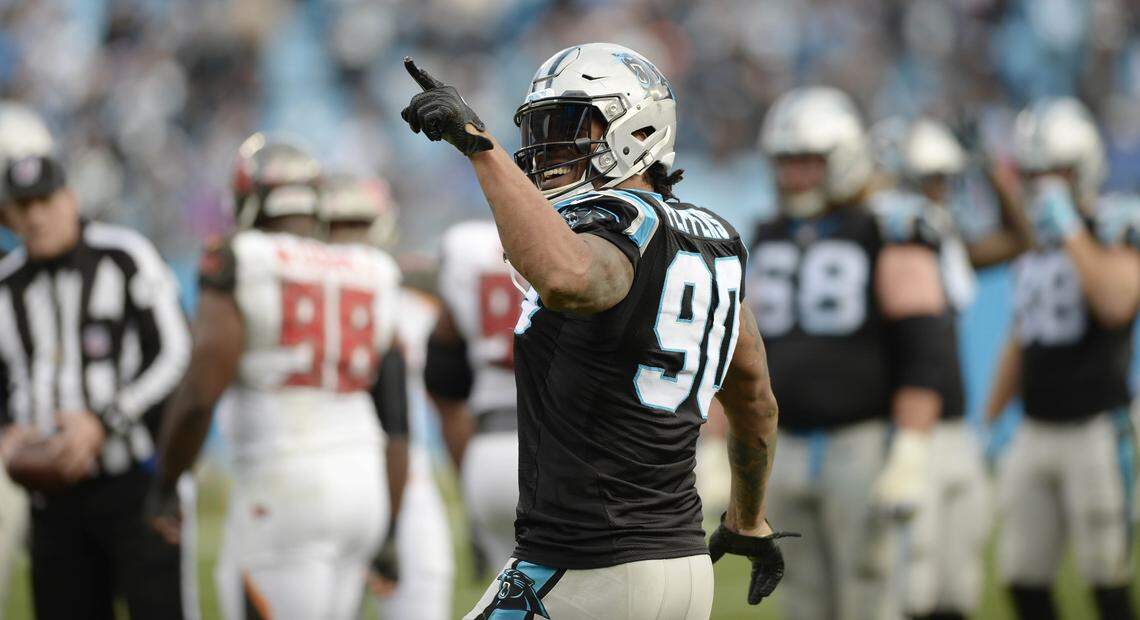 Carolina Panthers defensive end Julius Peppers (90) celebrates and points to the crowd after recovering a Tampa Bay Buccaneers fumble during the second half at Bank of America Stadium on Sunday, December 24, 2017. The Panthers won, 22-19.