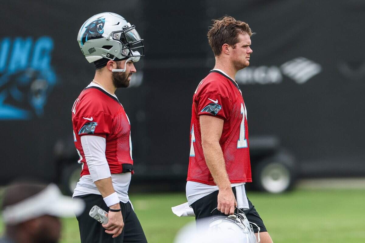 Panthers quarterback Baker Mayfield (left) and Sam Darnold in July 2022. After leaving Carolina, both players would become Pro Bowl quarterbacks and have led their respective teams into the NFL playoffs this season.