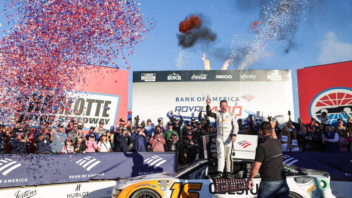 AJ Allmendinger celebrates after winning the Bank of America Roval 400 at Charlotte Motor Speedway on Sunday.