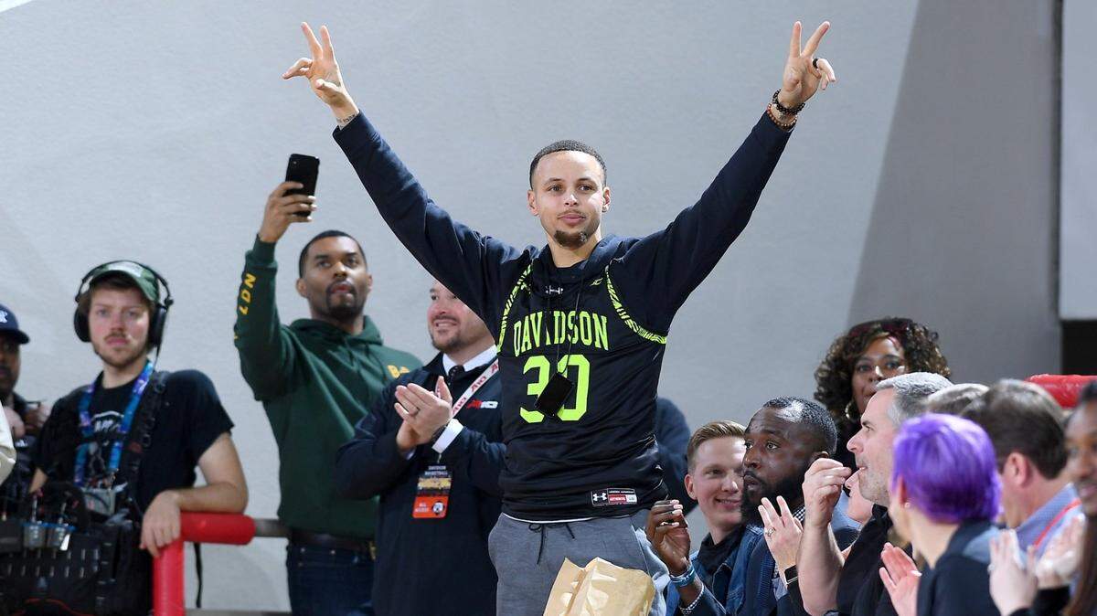 Golden State Warriors star and former Davidson Wildcat Stephen Curry is introduced to the Wildcat crowd at a game inside Davidson's Belk Arena in 2019. Curry and his wife are creating an endowed scholarship at the school north of Charlotte.