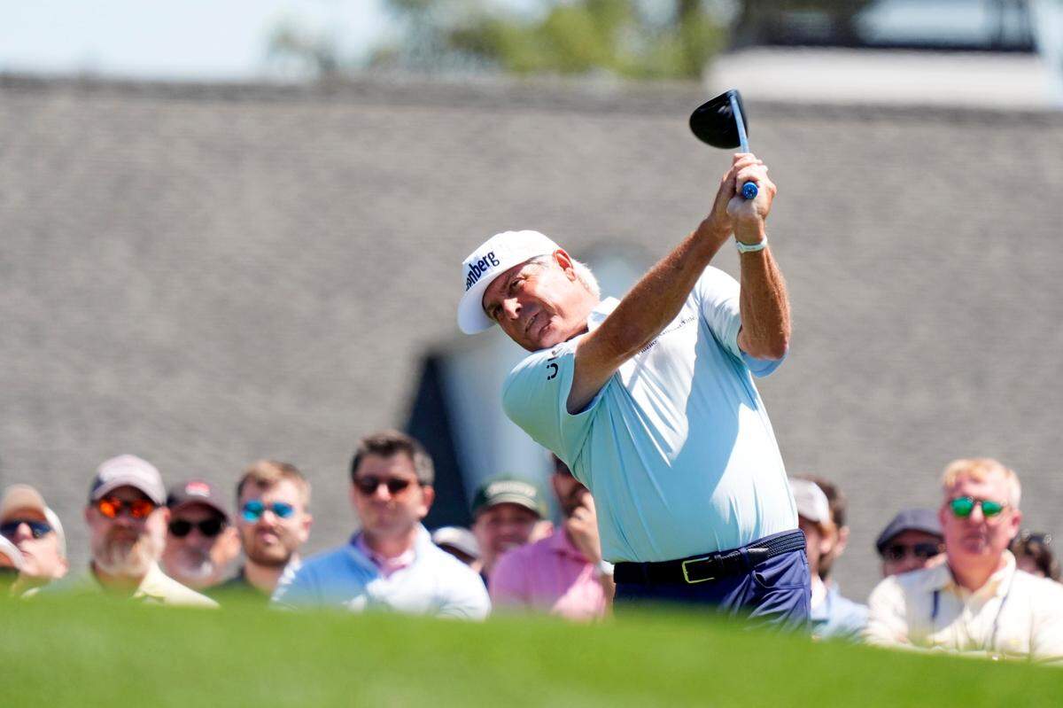 Fred Couples tees off on the first hole during Tuesday's practice round for the Masters Tournament at Augusta National Golf Club.