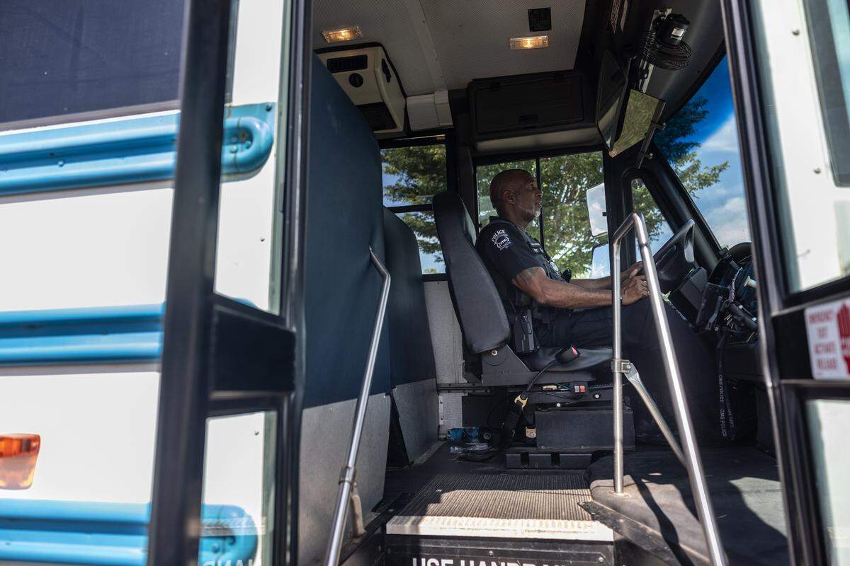 J.J. Flowers works as a school resource officer for Rocky River High School in Mint Hill, but also serves as a bus driver for sports teams like the volleyball team.