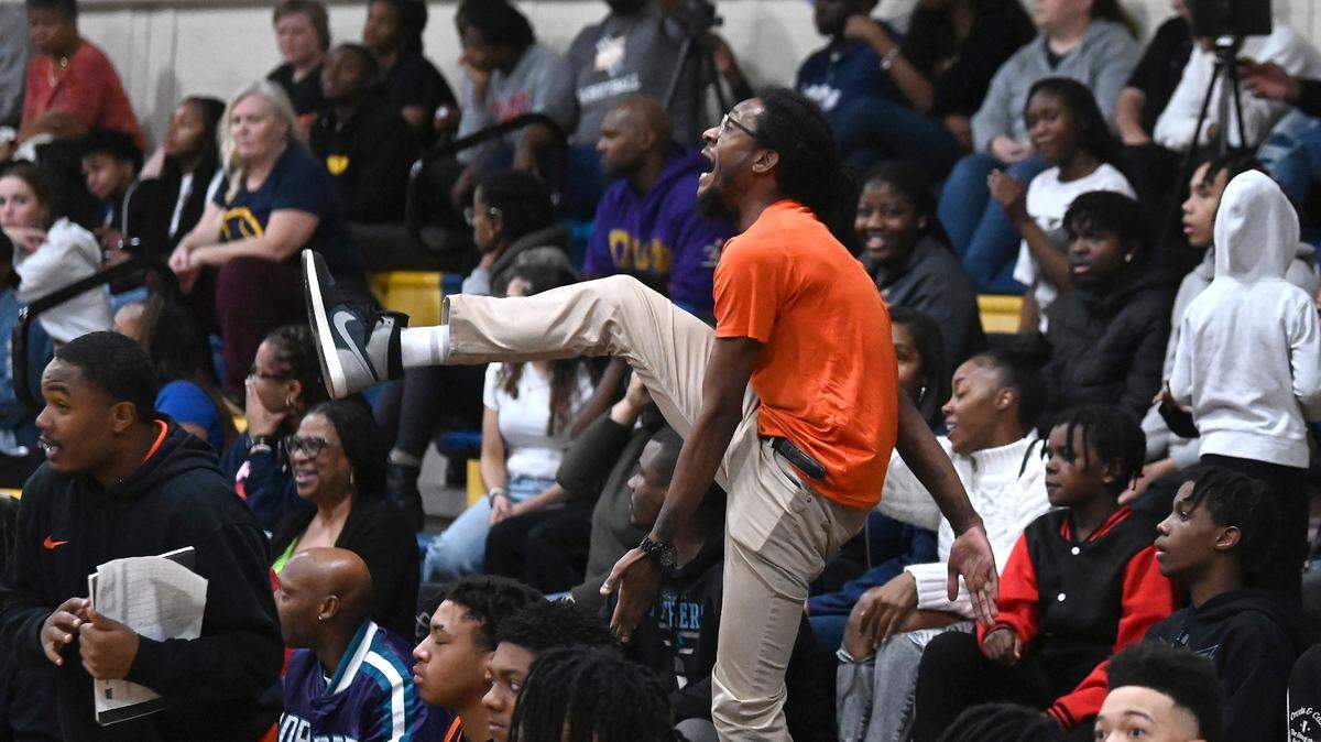 A Rocky River fan celebrates the team’s play against East Meck during action on Friday, January 26, 2024 at East Meck High. Rocky River defeated East Meck 66-57.