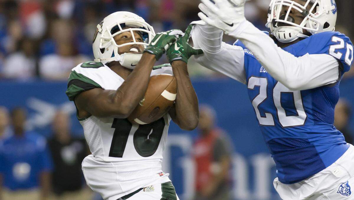 Former Charlotte wide receiver Austin Dukes catches a pass against Georgia State in the 49ers’ first game as an NCAA FBS program in 2015.