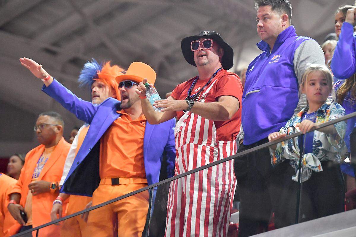 Marvin Ridge volleyball fans cheer on their team during action against Cardinal Gibbons in the first game of the 4A Championship.The Marvin Ridge Mavericks took on the Cardinal Gibbons Crusaders in the NCHSAA 4A Volleyball Championship match in Raleigh, N.C. on November 2, 2024.