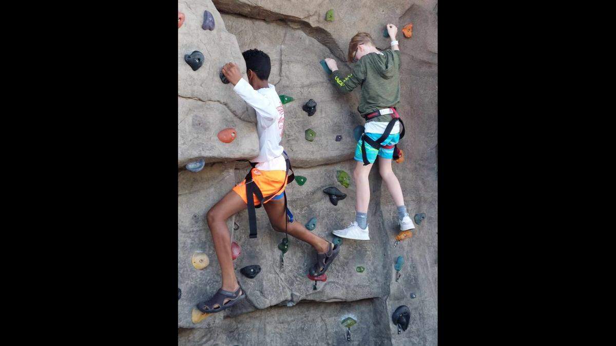 Twelve boy scouts from Honesdale, Pennsylvania went rock climbing at the Whitewater Center on Monday after missing their connecting flight to Florida on Sunday. 