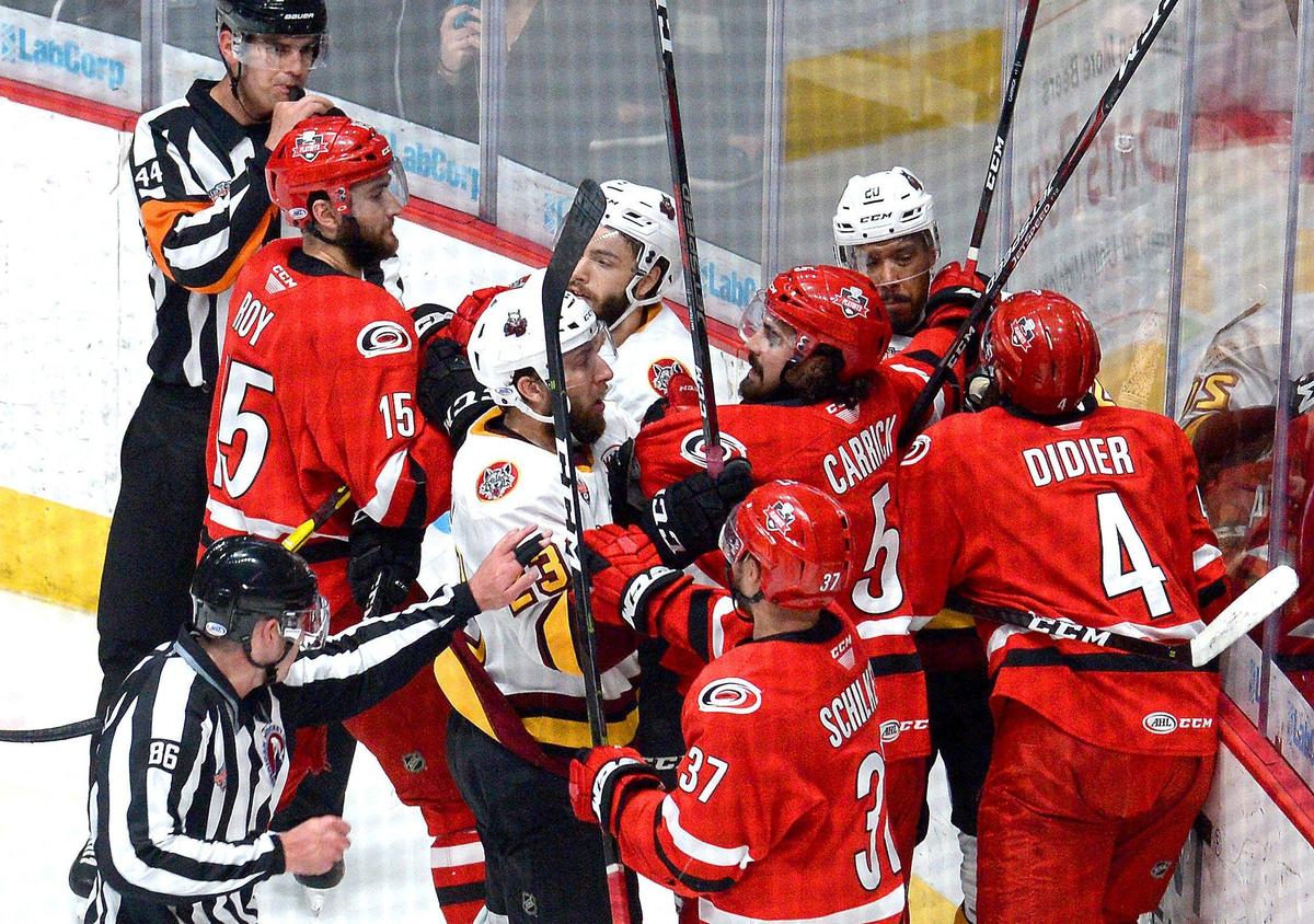The Charlotte Checkers and Chicago Wolves skirmish during first period action on Sunday, June 2, 2019 at Bojangles’ Coliseum in Charlotte, NC.