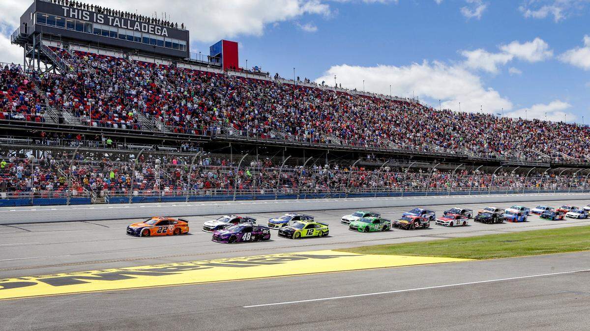 NASCAR Cup Series driver Joey Logano (22) leads the pack to the green flag during the Geico 500 NASCAR Sprint Cup auto race at Talladega Superspeedway Sunday, April 25, 2021 in Talladega, Ala. (AP Photo/Butch Dill)