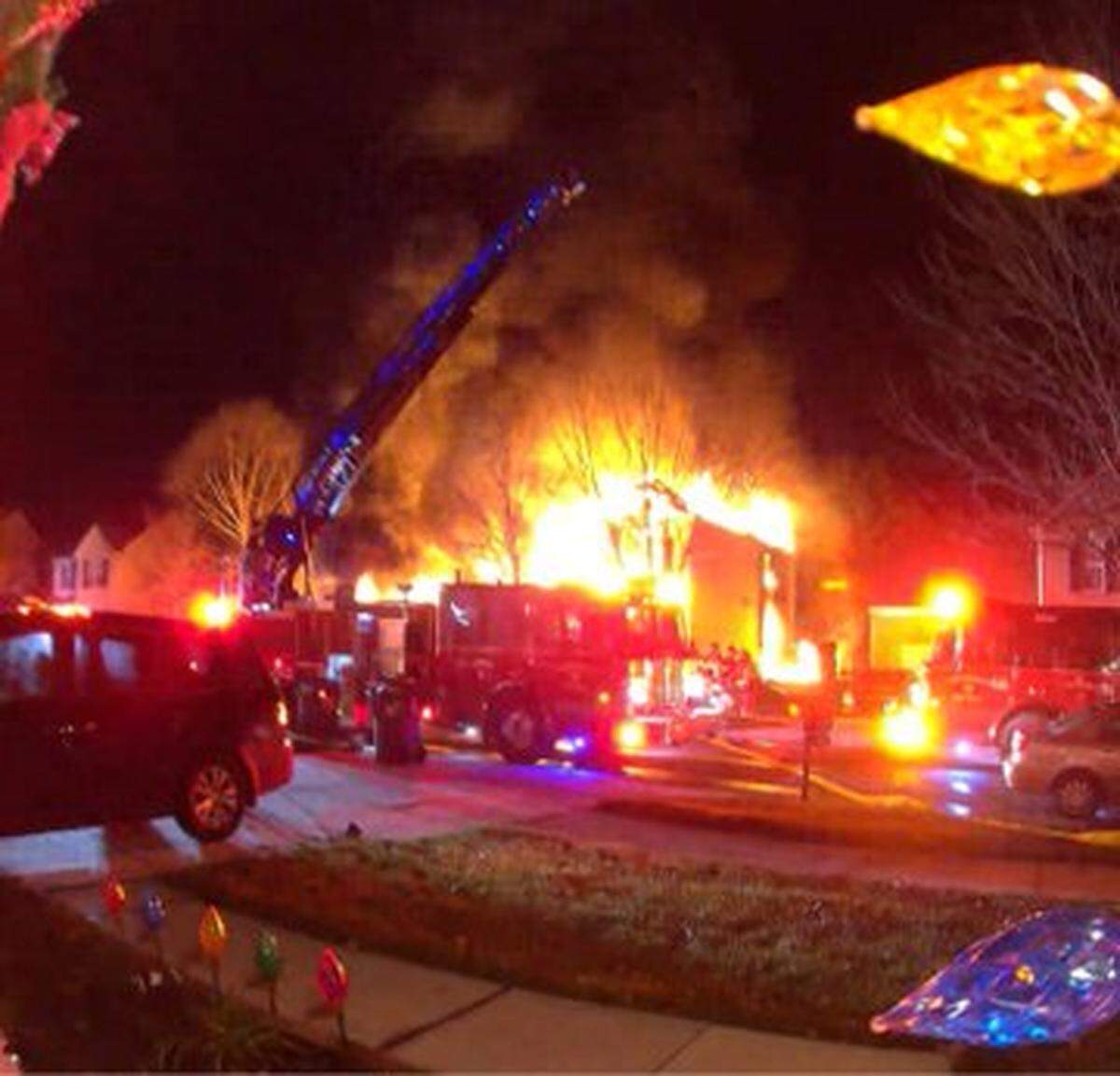 Flames were shooting through the roof of the home when firefighters arrived at this fire just northwest of Hopewell High School in northwest Mecklenburg County, Huntersville fire officials said.