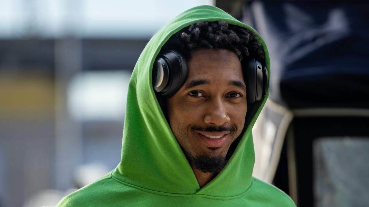 Charlotte Hornets forward Leaky Black (12) walks in off the bus before the game against the New Orleans Pelicans.
