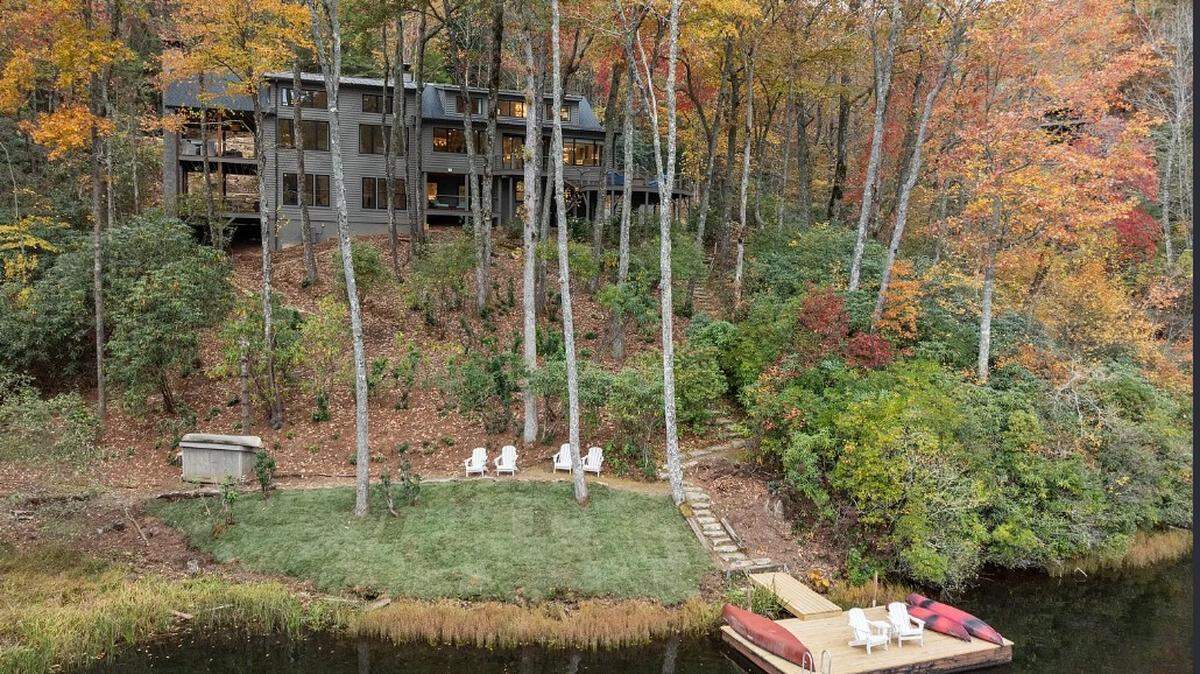 A 4,924-square-foot home home is for sale overlooking Lake Cardinal, near Lake Toxaway, the largest private lake in North Carolina.