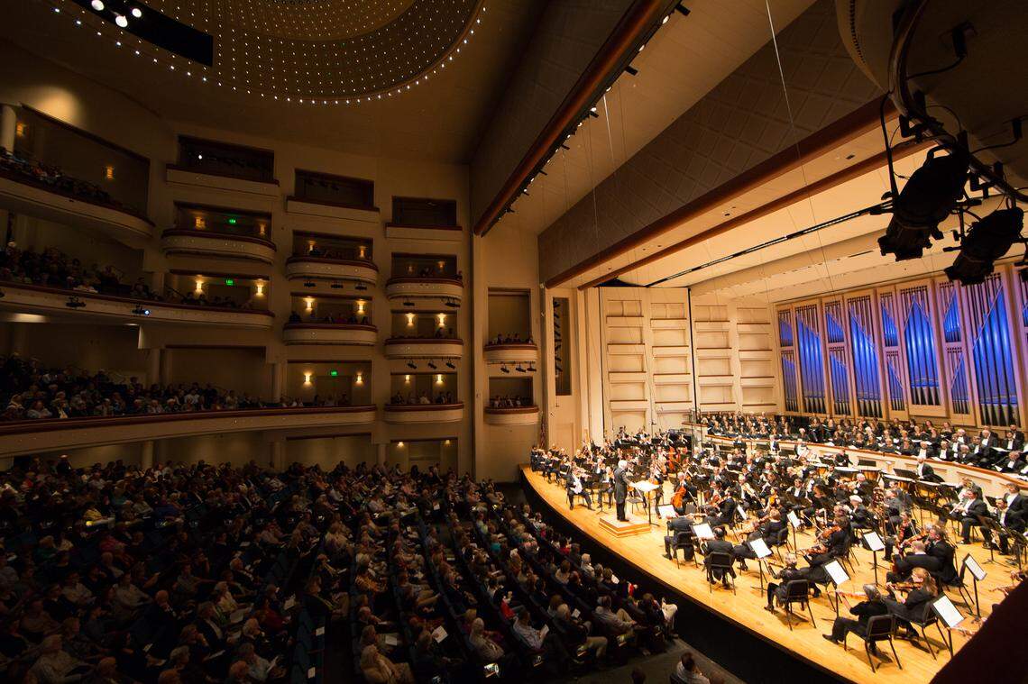 The Charlotte Symphony Orchestra on stage in the Belk Theater at the Blumenthal Performing Arts Center.