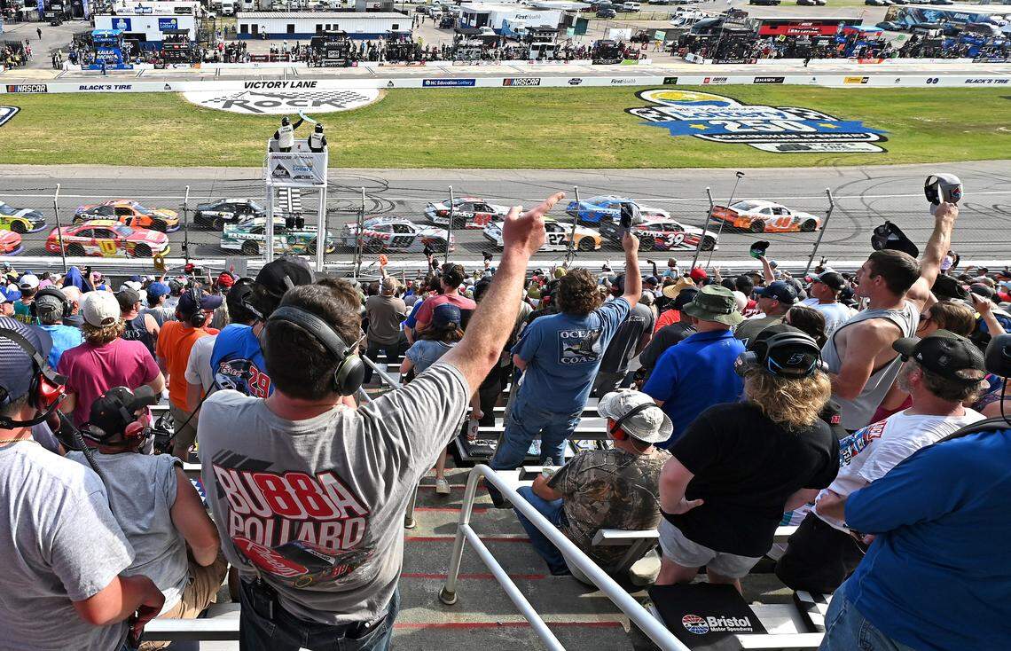 NASCAR fans cheer the Xfinity Series field in the North Carolina Education Lottery 250 as they race across the start line during action at Rockingham Speedway on April 19, 2025.