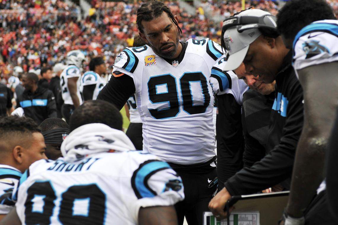 Carolina Panthers defensive end Julius Peppers (center) is a veteran on a pass-rush that has not been consistent this season and must find better ways to disrupt quarterbacks.