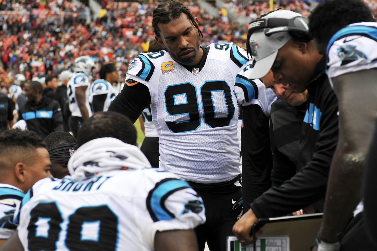 Carolina Panthers defensive end Julius Peppers (center) is a veteran on a pass-rush that has not been consistent this season and must find better ways to disrupt quarterbacks.
