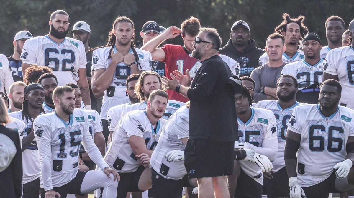 Coach Matt Rhule speaks to players before day 5 of Carolina Panthers training camp at Wofford College in Spartanburg, S.C., on Monday.