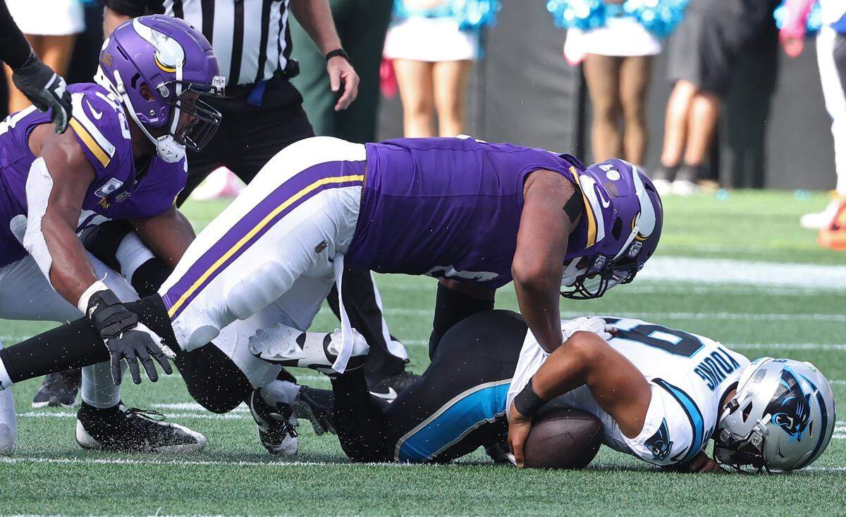 Carolina Panthers quarterback Bryce Young is sacked by Minnesota Vikings defense during fourth quarter action at Bank of America Stadium on Sunday, October 1, 2023. The Vikings defeated the Panthers 21-13.