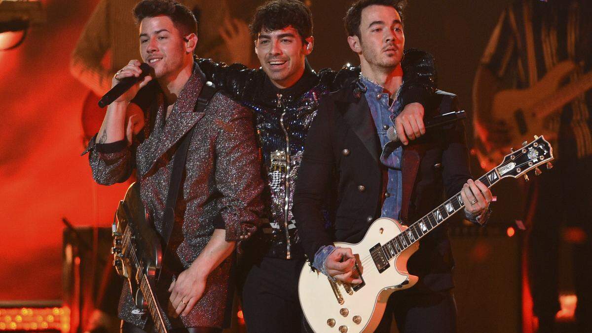 Nick Jonas, from left, Joe Jonas and Kevin Jonas, of the Jonas Brothers, perform a medley at the Billboard Music Awards on May 1. They will be at Charlotte’s Spectrum Center on Nov. 20.