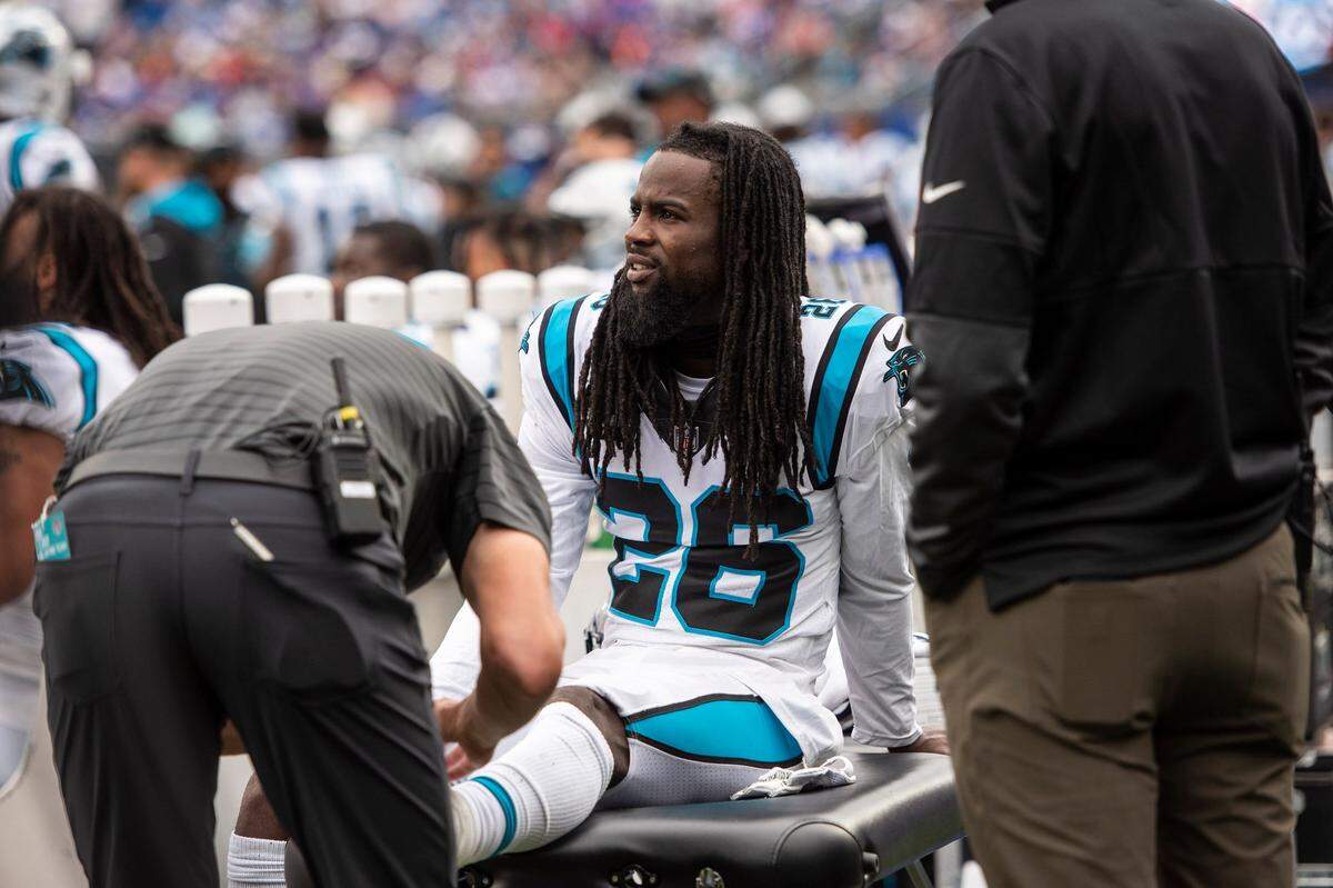 Panthers cornerback Donte Jackson gets his ankle looked at by an athletic trainer during the game against the Giants at MetLife Stadium on Sunday, October 24, 2021 in Rutherford, NJ.