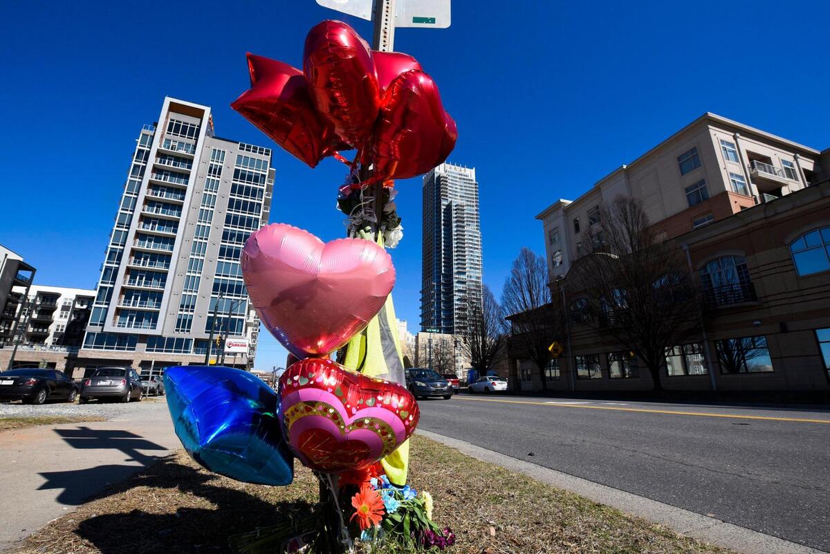 A memorial for slain Charlotte Area Transit System bus driver Ethan Rivera sits along South Graham Street near West Trade Street in Charlotte, N.C. Monday, Feb. 14, 2022. Rivera was shot while working on Friday night and died from his injures early Saturday morning.