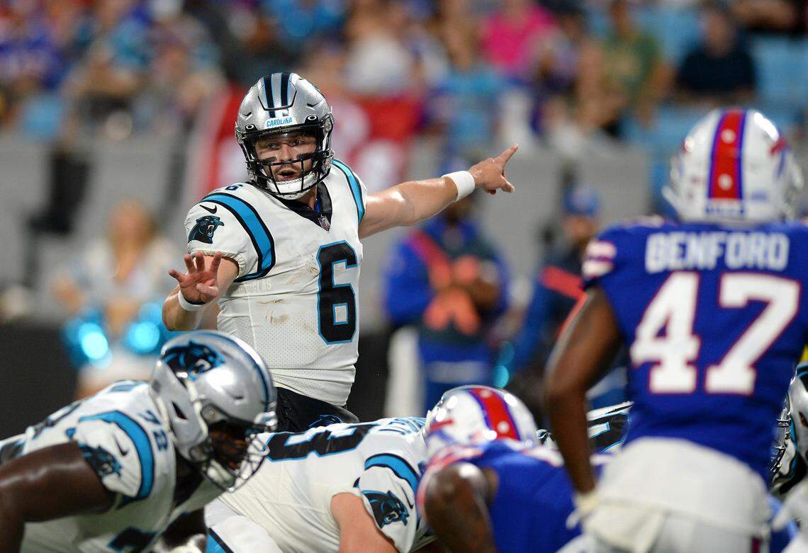 Carolina Panthers quarterback Baker Mayfield directs the offensive line in the red zone during first quarter action against the Buffalo Bills at Bank of America Stadium in Charlotte, NC on Friday, August 26, 2022.