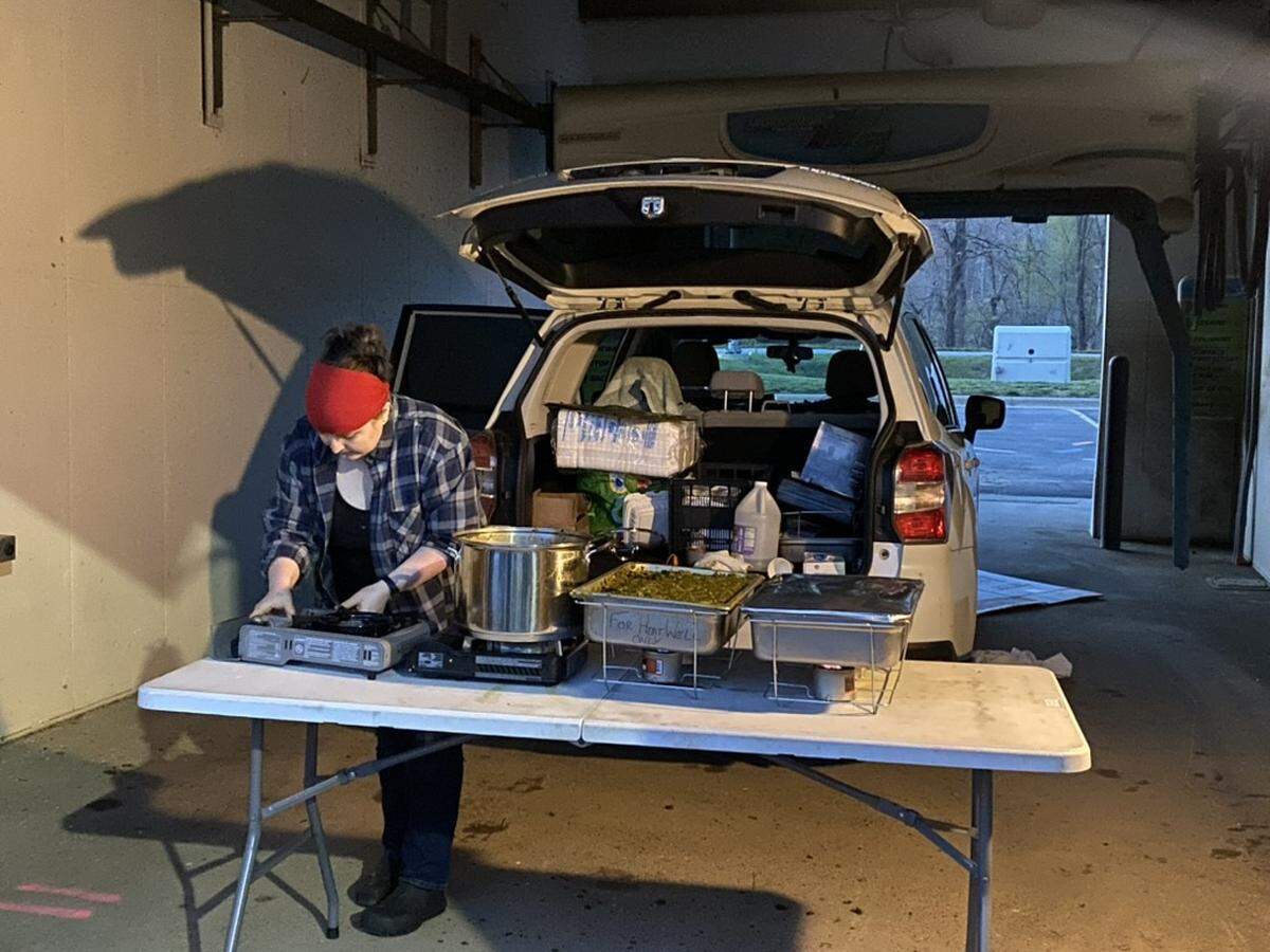 Gowan sets up her station in the bay of the disused car wash of the Swannanoa Ingles.