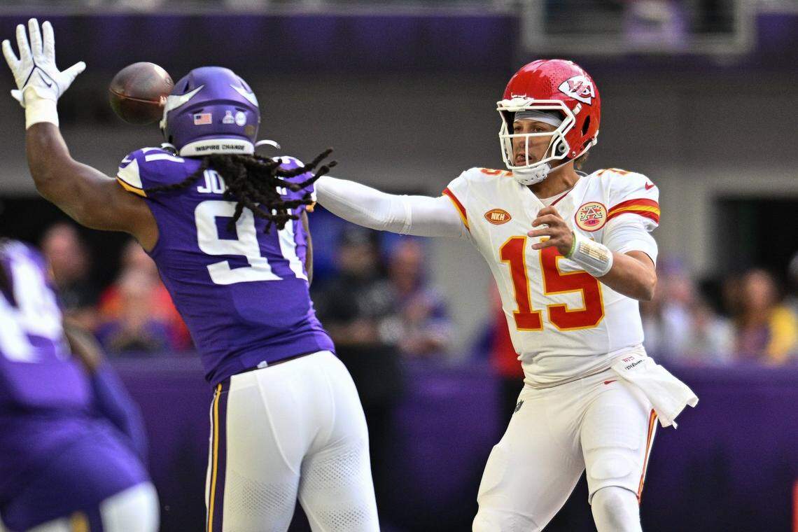 Oct 8, 2023; Minneapolis, Minnesota, USA; Kansas City Chiefs quarterback Patrick Mahomes (15) throws a pass as Minnesota Vikings linebacker Pat Jones II (91) defends during the second quarter at U.S. Bank Stadium. Mandatory Credit: Jeffrey Becker-USA TODAY Sports