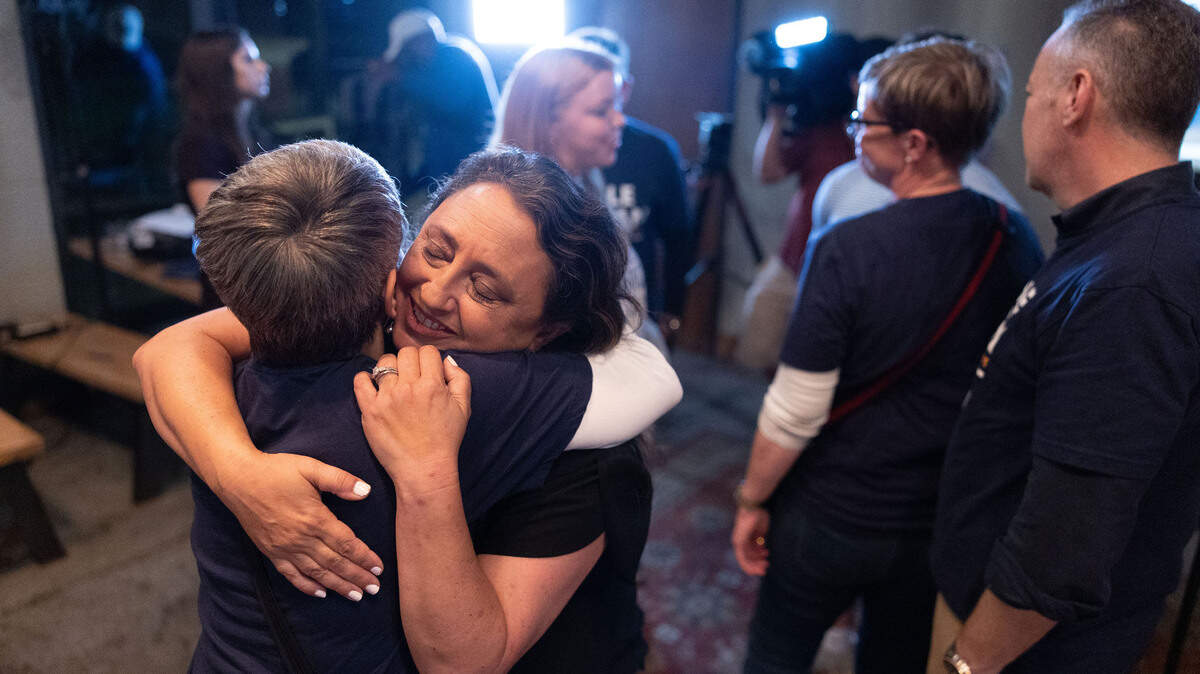 Nicole Sidman hugs her supporter during an election watch at Legion Brewing South Park in Charlotte Tuesday night, Nov. 5, 2024. GOP’s Tricia Cotham narrowly beats Sidman in NC House race