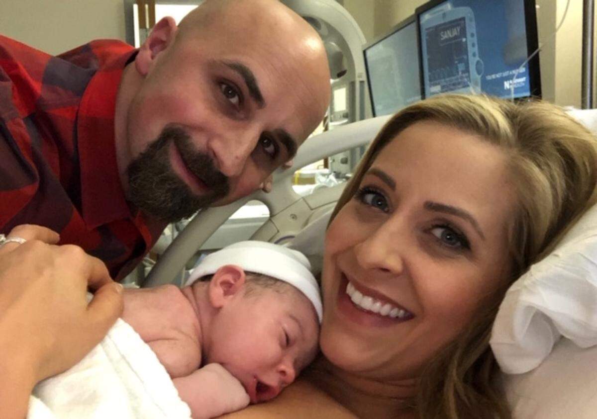 Allison Latos and her husband Josh celebrate the birth of their first child, Hope, in March 2018.