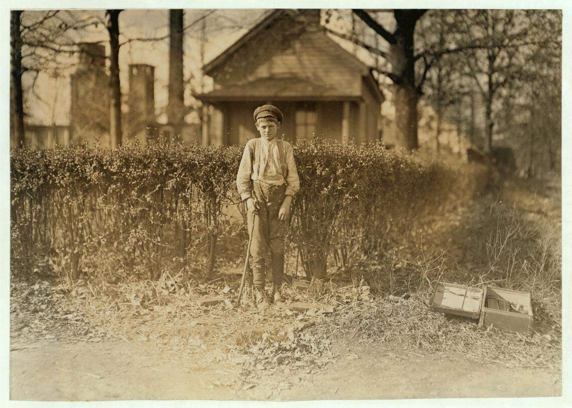 This photo of Johnnie Thomas, a child laborer in Charlotte’s Atherton Mill in 1909, is part of the Levine Museum’s current exhibition “Charlotte: Moving Forward, Looking Back.”