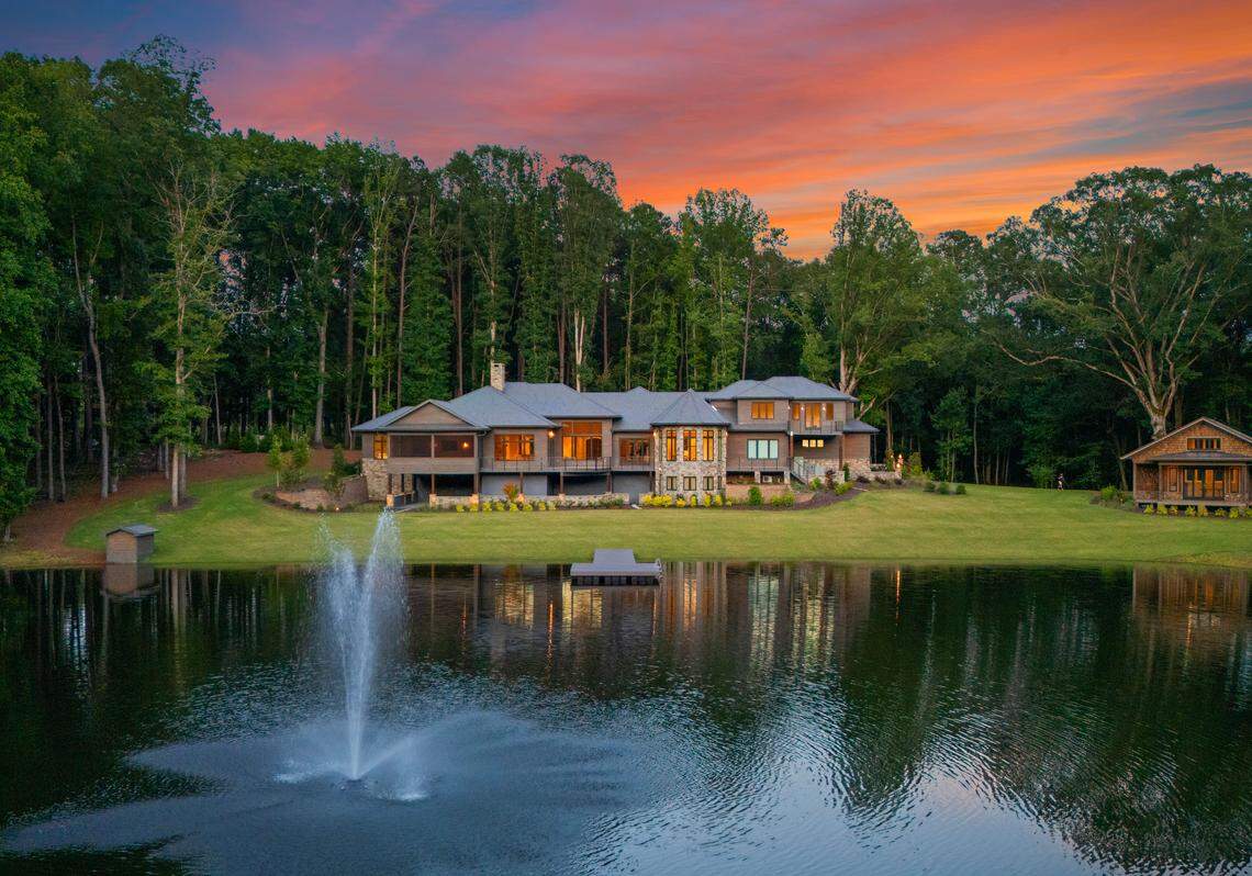 Each of the three residences on the property is situated near a private lake.