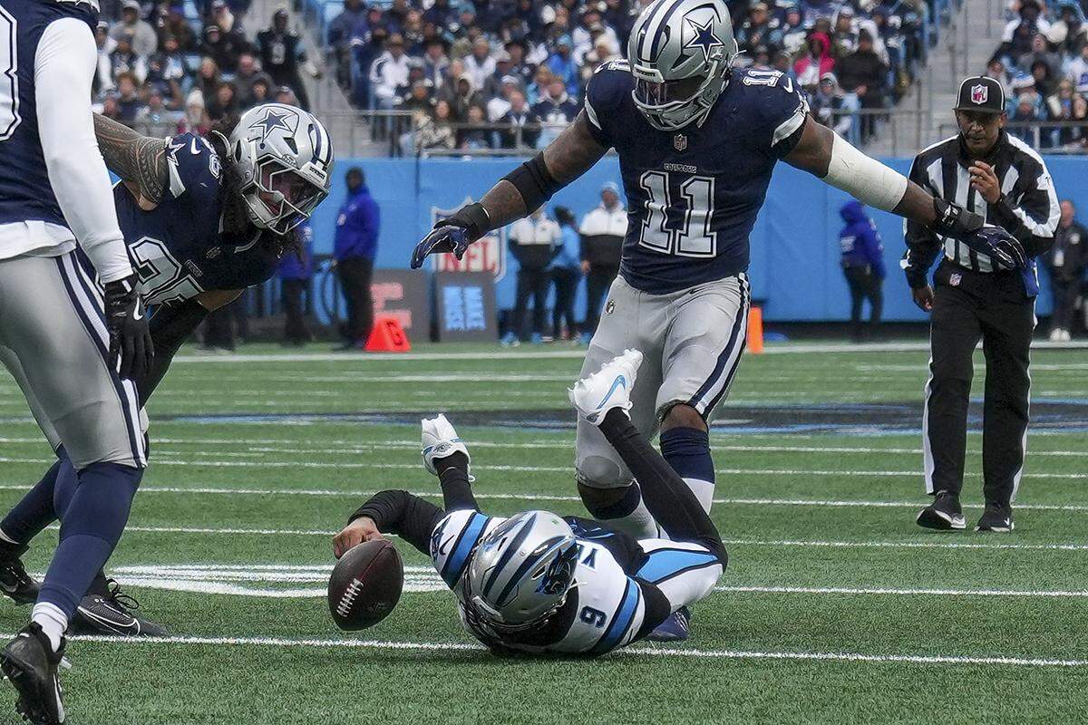 Carolina Panthers quarterback Bryce Young (9) loses a fumble during a drive against the Dallas Cowboys during Sunday’s first quarter at Bank of America Stadium.