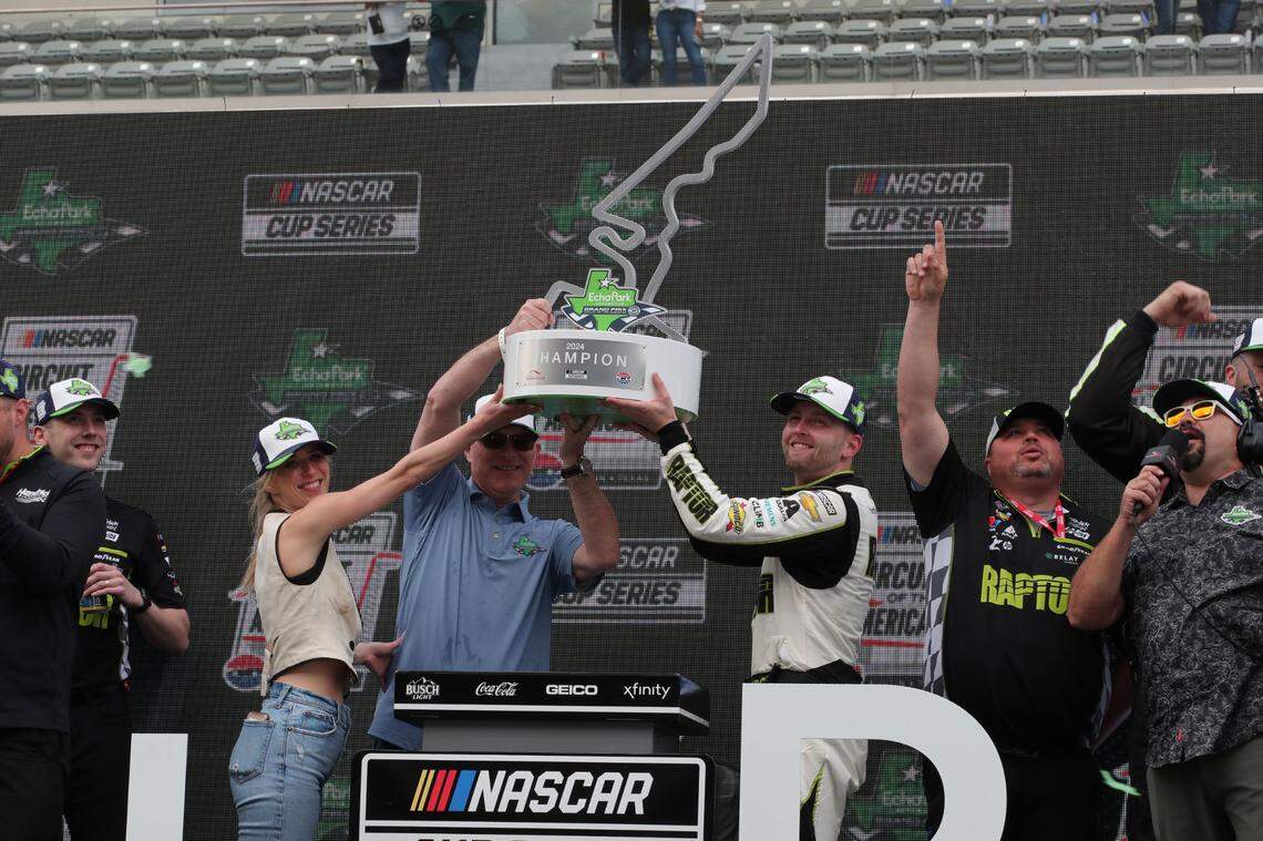 Mar 24, 2024; Austin, Texas, USA; NASCAR Cup Series driver William Byron (24) host the trophy after winning the EchoPark Automotive Grand Prix at Circuit of the Americas.