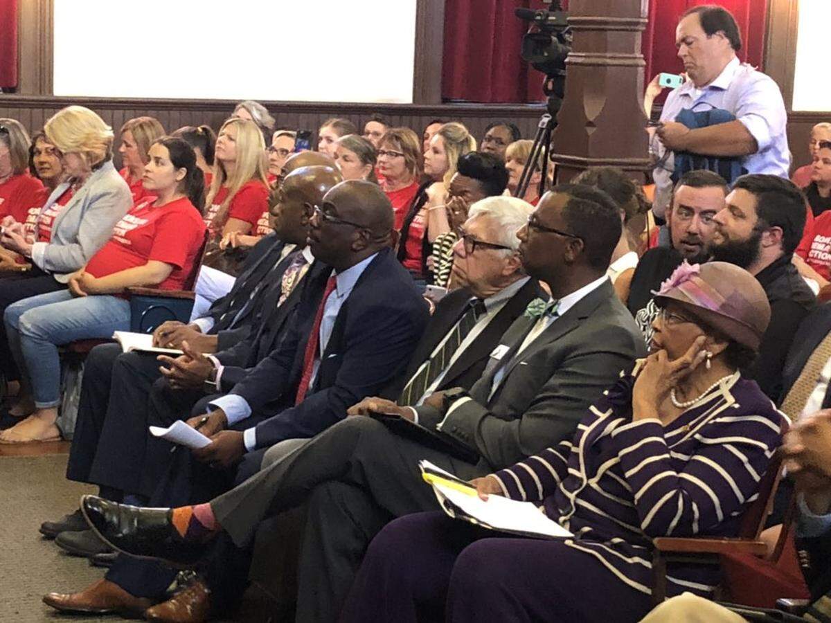 Cynthia Graham Hurd Foundation hosts a community conversation on gun violence on Aug. 15 at Johnson C. Smith University. Among the speakers seated in front: former Sen. Malcolm Graham, Meckleburg Sheriff Garry McFadden and U.S. Rep. Alma Adams.
