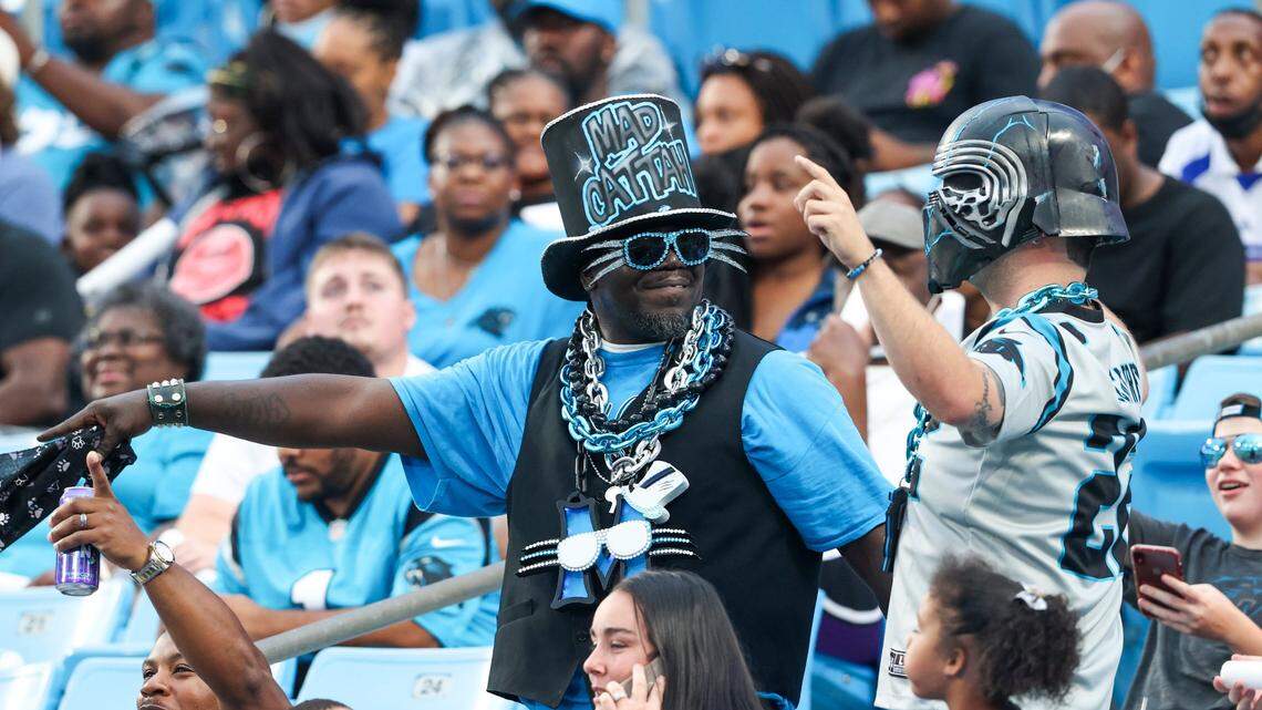 Carolina Panthers fans enjoy Fan Fest at the NFL football team’s training camp in Charlotte, N.C., Friday, Aug. 6, 2021. (AP Photo/Nell Redmond)