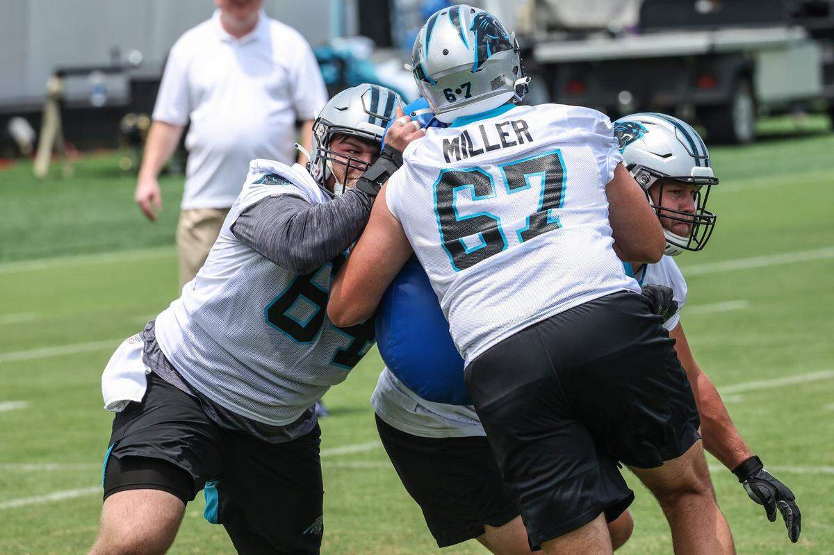 Panthers offensive lineman Cade Mays, left, goes through individual position drills during day two of mini camp on Wednesday, June 15, 2022 in Charlotte, NC.