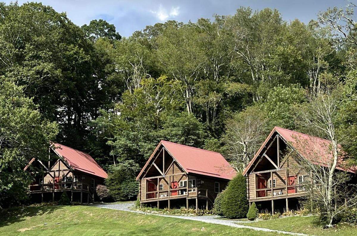 Cornerstone Cabins & Lodge offers pet-friendly rentals and a lodge that overlooks an open field, stream and pond.